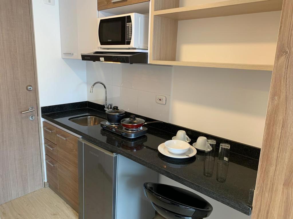 Aparta Estudios Connect Bogotá Szoba fotó